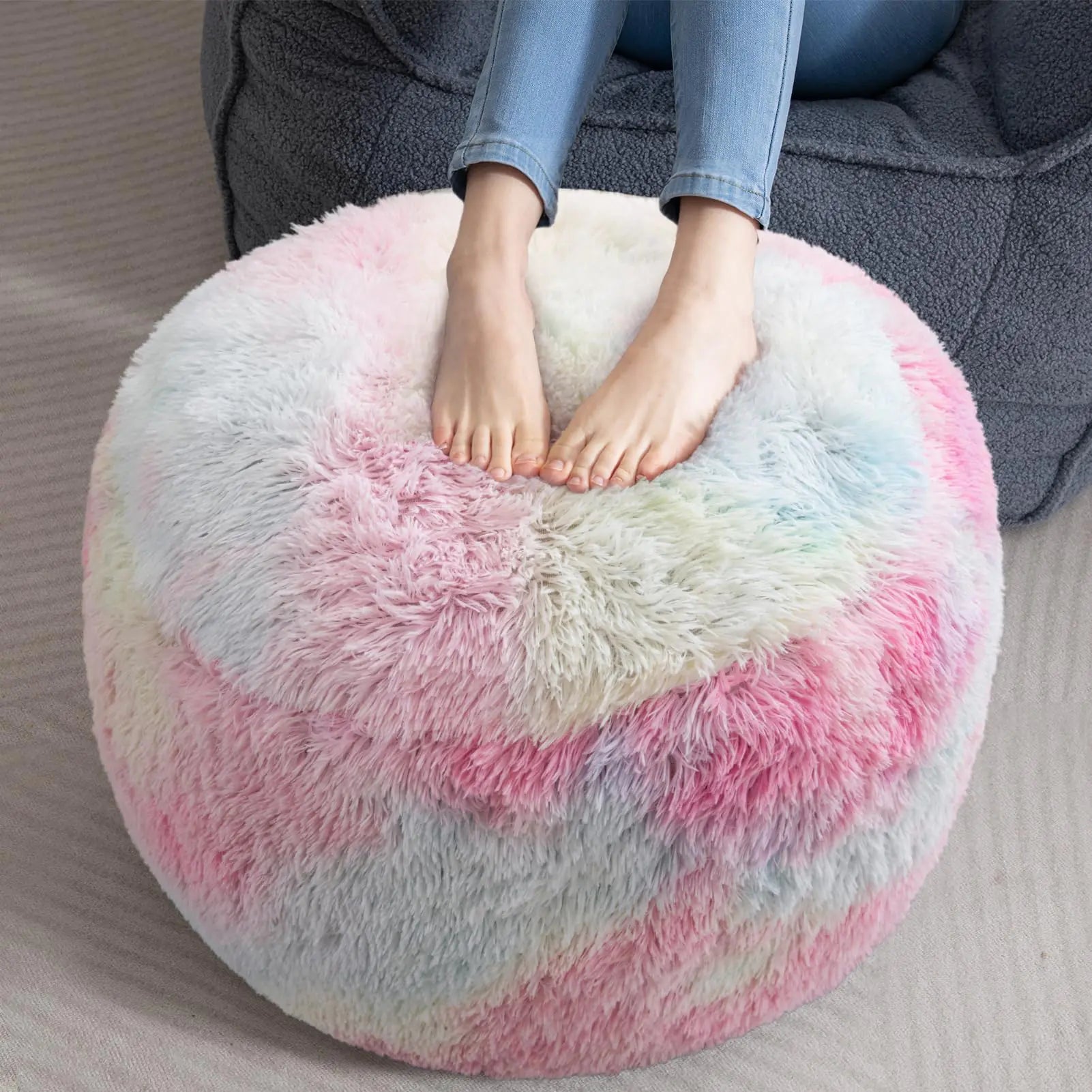 HIGOGOGO Round Stuffed Pouf Ottoman Long Faux Fur Poufs with Foam Chunk Filling Fluffy and Furry Pouf Foot Stool Storage Ottoman 26 X 18 Floor Poufs Foot Rest for Living Room Rainbow
